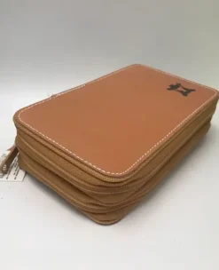 Penal dobbelt i skinn