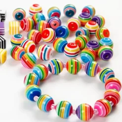 Plastperler stripete runde